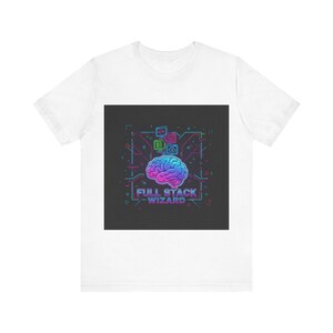 May include: White t-shirt with a graphic design. The design features a brain illustration in pink and blue, surrounded by circuit board elements. The text "FULL STACK WIZARD" is below the brain graphic.