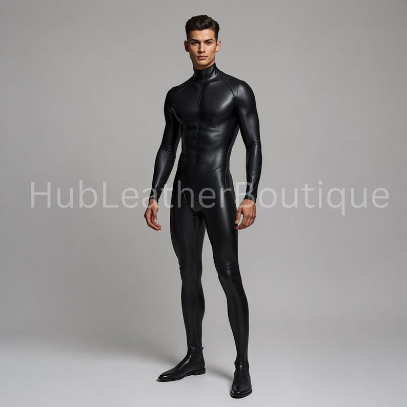 May include: A full-body black leather jumpsuit with a high collar and long sleeves. The jumpsuit has a front zipper and is form-fitting. The text "HubLeatherBoutique" is printed on the image.