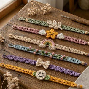 May include: A collection of colorful, handmade crochet bracelets. Each bracelet features unique designs, including a star, rainbow, clouds, leaves, a bow, and a smiley face. The bracelets are displayed on a wooden surface, showcasing the intricate details and vibrant colors.