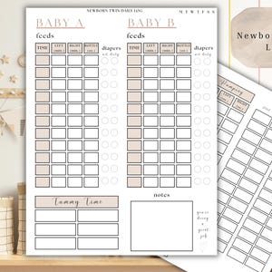 May include: A printed newborn twin daily log with sections for tracking feeds, diapers, tummy time, and notes. The log includes space for two babies, labeled Baby A and Baby B. The text "Newborn Twin Log" is also visible.