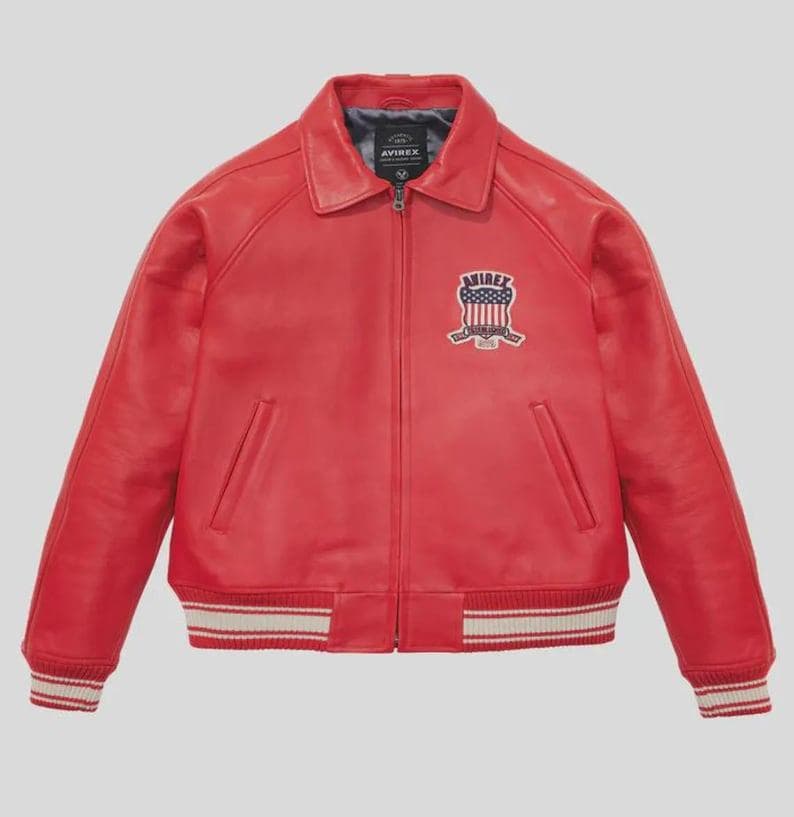 Premium Avirex USA red leather jacket with embroidered logo detailing, classic bomber style, ribbed cuffs and hem, high-quality craftsmanship.