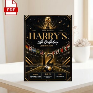 May include: A black and gold birthday invitation card featuring a soccer trophy, a soccer ball, and international flags. The text reads: YOU'RE INVITED TO HARRY'S 12th BIRTHDAY CELEBRATION, SATURDAY SEPTEMBER 27TH, 6:00 PM, 1234 FOOTBALL STREET, YOUR CITY, RSVP 020 1234 5678.