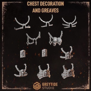 May include: A collection of eleven grey miniature chest decorations and greaves featuring skull motifs, chains, and arched metal plates. The text CHEST DECORATION AND GREAZE and GREYTIDE STUDIO is visible. These components are designed for tabletop gaming figures.