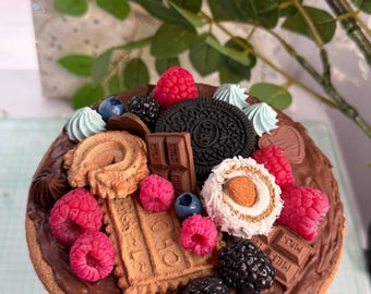 Fake food cake jar lid with realistic berries and chocolate