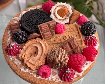 Fake food cake jar lid with realistic berries and chocolate