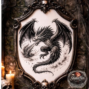 May include: A framed black and white dragon illustration. The dragon is depicted breathing fire, set against a speckled background. The ornate frame features skulls and scrollwork. The artwork is displayed on a textured stone wall.