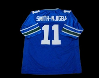 Camiseta de fútbol azul nueva de Jaxon Smith-Njigba de Seattle, sin firmar y cosida a medida. Todas las tallas: S-3XL.