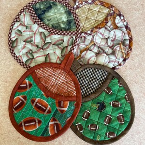 Sports themes.  Football, Baseball, Pocket potholders, quilted, with heat insulation, hand made.