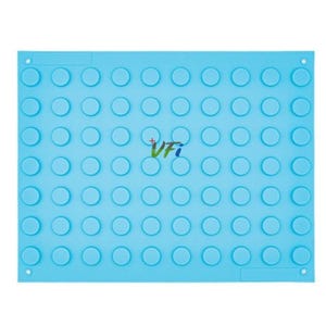 May include: A light blue silicone baking mat with evenly spaced, raised circular molds. The mat has rounded corners and small holes in each corner. The text "VFi" is printed in green in the center of the mat.