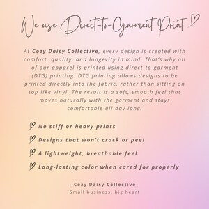 May include: A light pink and orange gradient informational graphic with dark brown text. The header reads We use Direct-To-Garment Print. The body text explains the DTG printing process used by Cozy Daisy Collective, followed by a list of benefits.