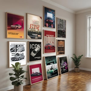 May include: A gallery wall featuring ten framed vertical posters of various sports cars, including a white Porsche 911 Turbo, a Nissan GT-R, a red BMW M3 E30, a white Lamborghini, a Pagani Huayra Roadster, and a green Ford Mustang, displayed on a beige wall.