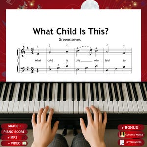 May include: A piano score for "What Child Is This?" with the melody of "Greensleeves" displayed on a white background. The piano keys are black and white, and the hands are playing the piano. The image includes text for Grade I, Piano Score, MP3, and Video.
