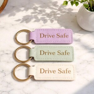 May include: A rustic wooden sign with the text "Welcome to our home" in a handwritten style. The sign features a distressed finish and a simple, inviting design, perfect for entryway decor.