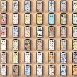 May include: A grid of smartphones, each with a different wallpaper design and the time displayed as 9:41. The wallpapers showcase a variety of themes, from floral and animal motifs to abstract art, all set against a light wood surface.