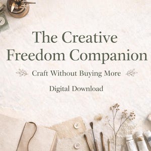 May include: A digital download titled "The Creative Freedom Companion" with the tagline "Craft Without Buying More." The image features craft supplies like paint tubes, brushes, a palette, and a sketchbook, suggesting a focus on creative projects.
