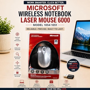 May include: A silver Microsoft Wireless Notebook Laser Mouse 6000, model 1054 1051, in its original clear plastic retail packaging. The packaging features red and white branding, listing features like 1000 DPI laser precision, wireless freedom, a magnifier button, and a tilt wheel for 4-way scrolling.