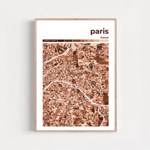Puede incluir: Impresión enmarcada de un mapa de París, Francia, en tonos marrones y blancos. El nombre de la ciudad se muestra en la parte superior, con el nombre del país debajo. Las coordenadas se muestran en la esquina superior izquierda.