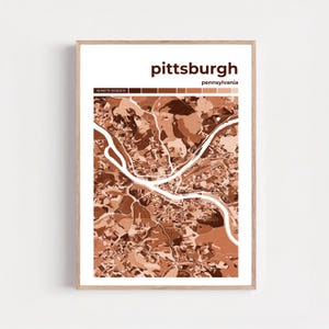 Puede incluir: Una taza de cerámica blanca con un asa negra y el texto "But First, Coffee" en negro, con una fuente de estilo manuscrito. La taza está sobre una superficie blanca.