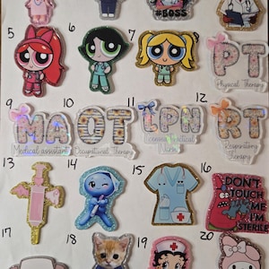 May include: A collection of twenty numbered acrylic badges featuring various medical-themed characters, professions, and acronyms like MA, OT, LPN, and RT. The designs include cartoon figures, a syringe, a scrub top, and a cat, all with glitter accents.