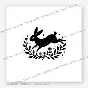 May include: A black silhouette of a leaping rabbit surrounded by a floral wreath and stars. The design is set against a white background. Text at the bottom reads "Spring Bunny Botanical - Leaping Sprig".