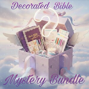 May include: A purple gift box overflowing with stationery supplies, including a Bible, pens, and washi tape. The box is decorated with angel wings and ribbons, with the words "Decorated Bible Mystery Bundle" in a whimsical font.