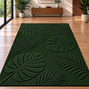 Alfombra de lana tejida a mano con diseño de hojas tropicales / hojas de palmera Monstera, color verde bosque.