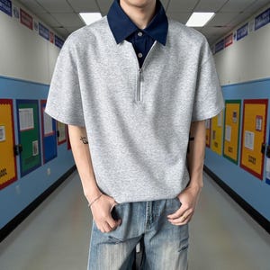 Half Zip Polo Shirt | Short Sleeve Casual Top | Daily Wear | Minimal Streetwear Style

Half zip polo shirt with layered collar and relaxed minimalist streetwear style