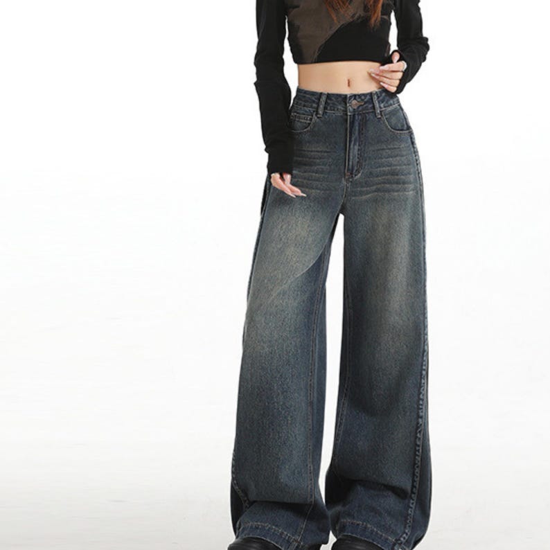Women's Wide Leg Jeans | High Waisted Denim Pants | Korean Streetwear Style | Retro Y2K Trend

High waisted wide leg jeans with washed denim finish for korean streetwear styling