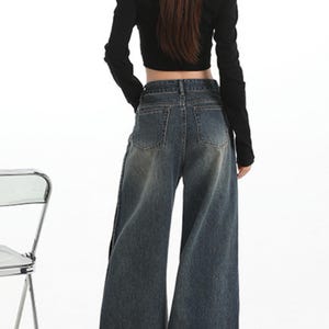 Women's Wide Leg Jeans | High Waisted Denim Pants | Korean Streetwear Style | Retro Y2K Trend

High waisted wide leg jeans with washed denim finish for korean streetwear styling