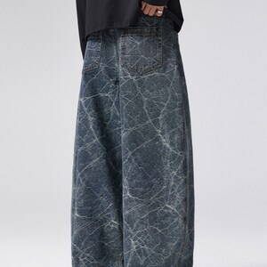 Abstract Washed Jeans | Baggy Wide Leg Pants | Daily Wear | Retro Streetwear Style

Abstract wash baggy jeans with retro streetwear style