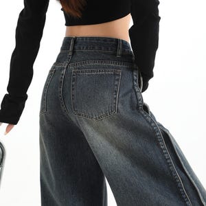 Women's Wide Leg Jeans | High Waisted Denim Pants | Korean Streetwear Style | Retro Y2K Trend

High waisted wide leg jeans with washed denim finish for korean streetwear styling