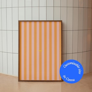 Könnte beinhalten: Gerahmter Kunstdruck mit vertikalem Streifenmuster in abwechselnden Orange- und Rosatönen. Das Kunstwerk befindet sich in einem braunen Holzrahmen. Der Text "wrinkles" befindet sich in der Mitte. Ein blauer Kreis mit Text befindet sich unten rechts.