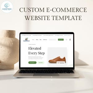 May include: A laptop displaying a website template with the text "Custom E-Commerce Website Template." The website features a clean design with a product image of a brown shoe and the words "Elevated Every Step."