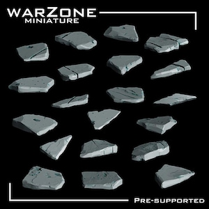 May include: A selection of grey miniature rocks, in various sizes and shapes, set against a black backdrop. The rocks have a textured surface, with cracks and fissures. The text "WARZONE MINIATURE" is at the top, and "PRE-SUPPORTED" at the bottom.