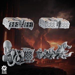 May include: Gray plastic miniature war game components. The image shows two missile launchers, a weapon with a dragon head, and a flame effect. The components are designed for tabletop gaming.
