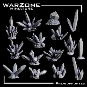 May include: A collection of gray miniature crystal formations, varying in size and shape, against a black background. The crystals have sharp, geometric facets and are mounted on textured bases. The text "WARZONE MINIATURE" and "PRE-SUPPORTED" are visible.