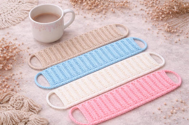 May include: A set of three ceramic mugs with a speckled, matte finish. The mugs are in shades of cream, light gray, and dark gray. Each mug has a simple, minimalist design, perfect for coffee or tea.