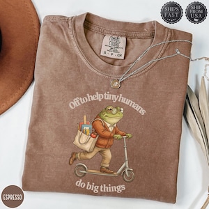 Off To Help Tiny Humans Shirt, Comfort Colors Frog Teacher T-Shirt, Cute Frog Scooter Cottagecore Tee, Back To School Teacher Gift