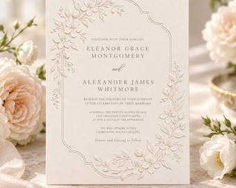 May include: A cream-coloured wedding invitation card featuring an embossed floral border with delicate blossoms and leaves. The text reads: Together with their families, Eleanor Grace Montgomery and Alexander James Whitmore request the pleasure of your company at the celebration of their marriage, Saturday, the twenty-second of May, two thousand twenty-seven, at five o'clock in the afternoon, The Willowmere Estate, Charleston, South Carolina, dinner and dancing to follow.