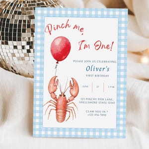 May include: A birthday invitation with a blue gingham border. The invitation features a watercolor illustration of a red lobster holding a red balloon. Text includes "Pinch me, I'm One!" and details for Oliver's first birthday.