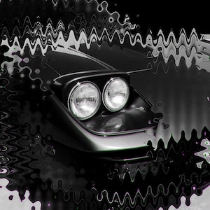 May include: Black and white image of a car's front end, featuring two round headlights. The car's hood and headlights are in focus, with a wavy, distorted effect overlaying the image, creating a unique visual texture.