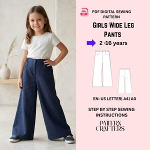 May include: A young girl wearing navy blue wide-leg pants and a white t-shirt. The image also includes a sewing pattern diagram for girls' wide-leg pants, with the text "GIRLS WIDE LEG PANTS 2-16 years".