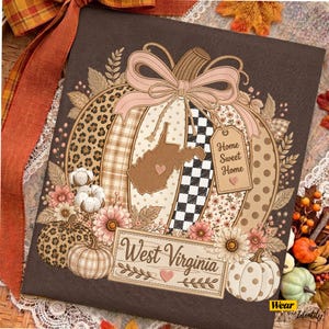 May include: A dark brown fabric print featuring a large central pumpkin with sections of leopard print, plaid, polka dots, and black-and-white checks. A West Virginia state silhouette with a heart and a tag reading Home Sweet Home are included.