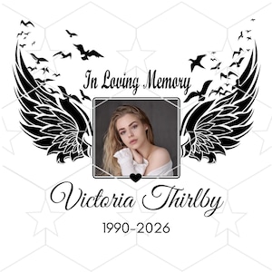 May include: A memorial design featuring a framed photograph of a woman, surrounded by stylized black wings and flying birds. The text "In Loving Memory" and the name "Victoria Thirlby" are displayed, along with the years 1990-2026.