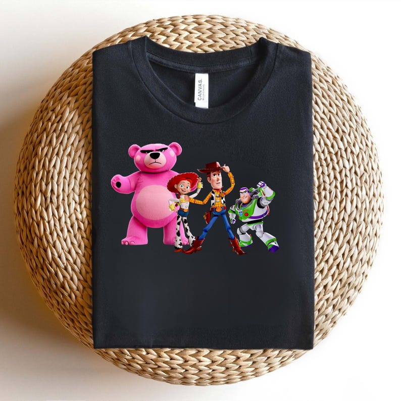 May include: A white ceramic mug with a black handle and the text "But First, Coffee" in a bold, black font. The mug is set against a neutral background, highlighting its simple design.