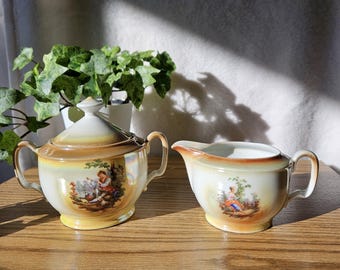 Juego de azucarero y lechera de cerámica iridiscente color melocotón, estilo Victoria vintage de Checoslovaquia.