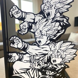 Sujetalibros Anime Power Up / Soporte para libros con escenas de energía manga / Decoración de estantería de acción / Regalo geek para amantes del anime imagen 2