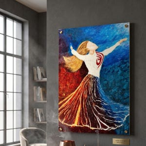 May include: A vibrant painting of a figure in a flowing dress with arms outstretched. The artwork features a color gradient from red to blue, with a white top and long blonde hair. The painting is mounted on a wall with brass hardware.