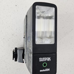 May include: A rustic wooden sign with the text "Welcome to our home" in white lettering. The sign features a distressed finish and a simple, inviting design, perfect for entryway decor.