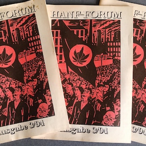 May include: Three vintage "Hanf-Forum" magazines. Each cover displays a red and black illustration of a crowd, a flag with a cannabis leaf, and industrial buildings. The text "Ausgabe 3/94" is printed at the bottom of each cover.